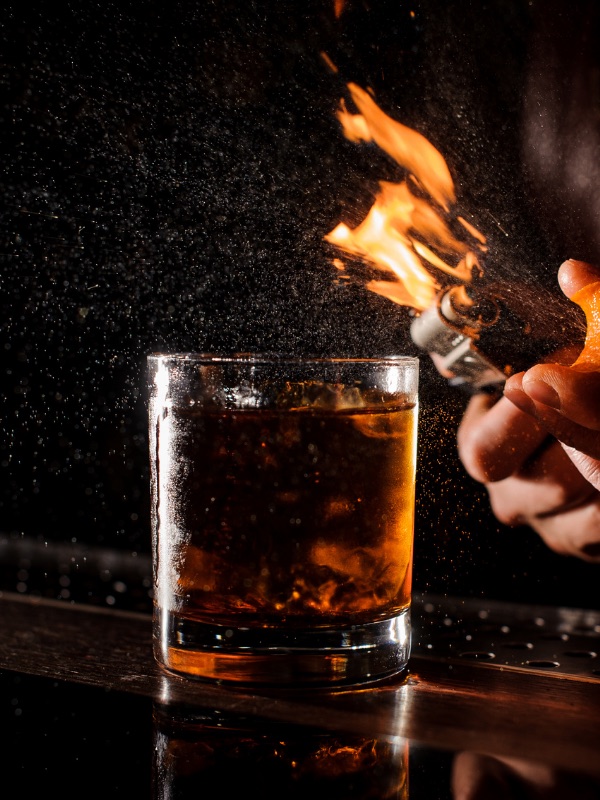 Flair bartender with fire